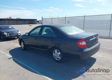 2002 Toyota Camry Le V6 z USA, uszkodzony, nr VIN 4T1BF32K22U004503